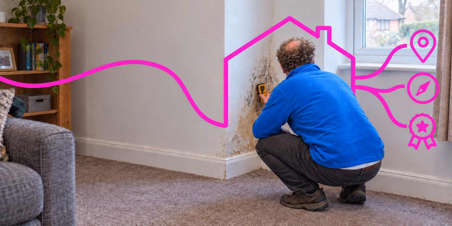 An image of a Tenant Help Service assessor completing damp checks on a wall for a tenant to determine if they have housing disrepair, one of our core services.